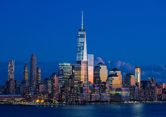 Downtown Manhattan wit Freedom Tower at dusk
