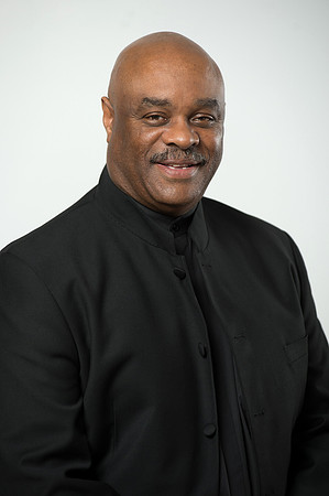 Portrait of African American man dressed in black