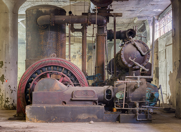 Vintage power generator in basement of commercial building