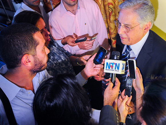 Brazils former president Fernando Henrique Cardoso speaking with reporters.